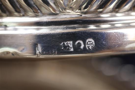 A pair of late George III silver coasters, approx. 6in.